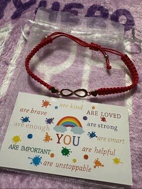 Gold Infinity Red Corded Adjustable Bracelet with affirmation card in sheer bag